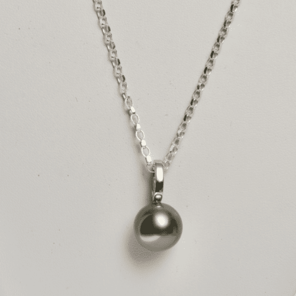 Pendentif "clip" en argent rhodié, Perle de Tahiti ronde de 12,9 mm A .