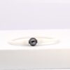 Polu bracelet perle en silicone blanc avec perle de Tahiti bleu roi semi-ronde de 10 mm, fait main en circuit court