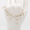 Bracelet Poeiti avec 19 keshi de Tahiti blancs nacrés montés sur chaîne en or jaune 14K
