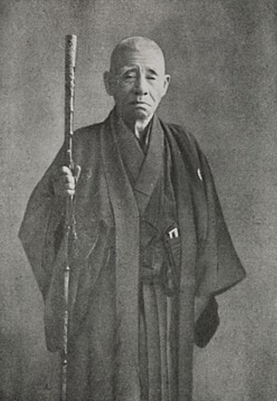 Portrait ancien de Kokichi Mikimoto, pionnier de la perliculture moderne et inventeur de la greffe perlière, fondement des perles de Tahiti authentiques